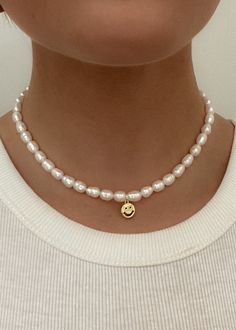 Natural (real) pearl necklace with gold plated smiley face. Extender to wear as a choker or regular necklace Trendy Pearl Charm Choker Necklace, Trendy Pearl Choker Necklace With Charm, Trendy Everyday Pearl Necklace With Pearl Charm, Trendy Pearl Necklace With Charm For Everyday, Trendy Everyday Pearl Necklace, Regular Necklace, Pearl Necklace With Gold, Handmade Pearl Necklace, Real Pearl Necklace