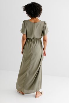 The modest formal maxi dress that you have been waiting for! The ‘Naomi’ is effortless and feminine - the perfect pick for family photos, an elegant party, or a modest bridesmaid dress. This timeless dress features a modest scoop neckline, flutter sleeves, and a chiffon overlay. The lightly gathered elastic waist and zipper closure allow for ease of styling and a flattering fit. This dress is fully lined - no layering required! Exclusively designed with you in mind. Self & Lining 100% Polyester Modest Bridesmaid Dress, Formal Maxi Dress, Modest Bridesmaid Dresses, Timeless Dress, Chiffon Overlay, Maxi Dress Formal, Layered Tops, Chiffon Maxi, Chiffon Maxi Dress