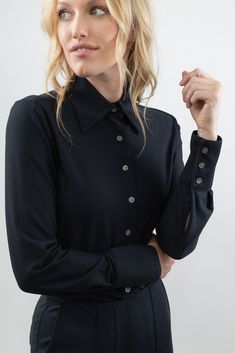 The Bubble Blouse offers women lightweight, breathable, easy-care comfort in a sophisticated style. A looser fit blouse with a stylish collar and 3-button cuff. Compact, light, and soft, with two-way stretch. Made with Renew Bubble fabric, this blouse has a unique mesh texture, delicate feel, comfortable stretch and is fast drying. Feels like a veil on the skin. All Luxeire garments require no dry-cleaning with natural wrinkle release. Business Casual Blouse With Spread Collar And Hidden Buttons, Business Casual Blouse With Hidden Button Closure, Timeless Collared Tops For Business Casual, Business Casual Blouse With Spread Collar, Fitted Collared Timeless Top, Fitted Timeless Collared Top, Timeless Fitted Collared Top, Modern Collared Shirt For Work, Tailored Tops With Fold Down Collar For Work