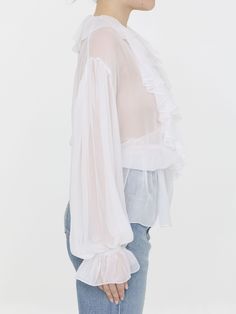 White sheer silk chiffon blouse with ruffles. It features wrap V-neck and stretch cuffs and hem. Loose fit. The model is 178cm tall and wears size IT 40. Size nationality: IT Product number: 35107034 Product code: F79FGTFU1ATW0800 Composition: 100% silk Chic Ruffled Silk Chiffon Blouse, Feminine Silk Chiffon Blouse For Spring, Feminine Silk Chiffon Blouse For Summer, Chic Silk Chiffon Blouse For Parties, Elegant Chiffon Tops For Layering, Silk Chiffon Top With Sheer Long Sleeves, Fitted Sheer Silk Chiffon Blouse, Summer Long Sleeve Silk Chiffon Tops, Chic Silk Chiffon Blouse With Sheer Sleeves