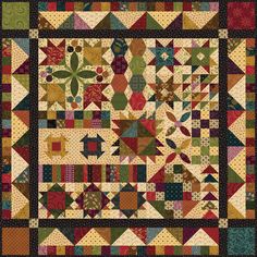 a quilt with many different colors and patterns on the front, along with a black background