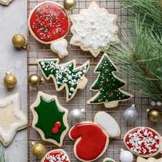 decorated christmas cookies on a cooling rack