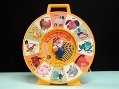 a wheel of fortune with pictures of animals on it and the words who had one of these?