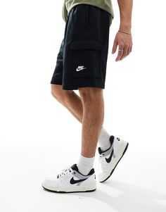 Shorts by Nike Take the short cut Branded design Regular rise Elasticized waistband Functional pockets Regular fit Casual Nike Cargo Pants With Side Pockets, Sporty Cargo Shorts With Built-in Shorts, Black Sports Bottoms With Multiple Pockets, Nike Athletic Shorts With Pockets, Nike Casual Cargo Pants For Streetwear, Casual Nike Cargo Pants For Streetwear, Sporty Bermuda Cargo Shorts, Black Cargo Shorts With Pockets For Sports, Black Summer Cargo Pants With Side Pockets