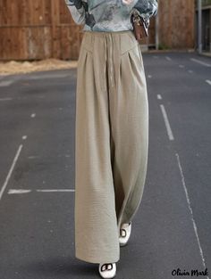 Olivia Mark - Elegant Long Skirt for Leisurely Afternoons Khaki Cotton Non-stretch Wide Leg Pants, Khaki Solid Color Bottoms For Fall, Solid Color Khaki Bottoms For Fall, Non-stretch Khaki Cargo Pants, Baggy Khaki Wide Leg Pants With Elastic Waistband, High Waist Khaki Bottoms For Fall, Spring Khaki Wide Leg Full-length Pants, High Waist Khaki Bottoms Solid Color, Baggy High-waisted Khaki Harem Pants