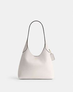 Buy Now Brooklyn Shoulder Bag 28 | COACH® Classic Hobo Bag With Snap Closure For Everyday, Elegant Hobo Shoulder Bag With Snap Closure, Elegant Hobo Bag With Snap Closure, Classic Structured Shoulder Bag With Textured Leather, Classic Hobo Shoulder Bag With Snap Closure, Elegant Rectangular Hobo Bag With Snap Closure, Elegant White Bags With Snap Closure, Classic White Hobo Bag For Formal Occasions, Elegant Leather Hobo Bag With Snap Closure