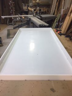 a large white sheet of paper sitting on top of a table