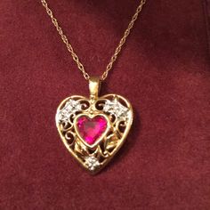 The Pendant Is 10k Gold And The 17” Chain Is 14k Gold. A Beautiful Piece Of Jewelry In New Condition (Never Worn). Price Is Firm On This Necklace. Pink Diamond Necklaces For Mother's Day, Mother's Day Pink Diamond Necklace, Pink 14k Gold Heart Cut Jewelry, Pink Heart Cut 14k Gold Jewelry, Pink Diamond Heart Cut Necklace, Pink Heart-shaped Diamond Necklace, Valentine's Day Heart Cut Necklace With 17 Jewels, Formal Birthstone Necklaces For Valentine's Day, Formal Heart Necklace With Birthstone For Valentine's Day