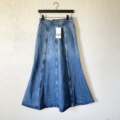 High Waist Long Skirt With Front Pockets. A-Line Silhouette. Side Hidden In-Seam Zip Closure. This Item Runs Long. Flared Denim Skirt In Medium Wash For Summer, Summer Flare Denim Skirt In Medium Wash, Spring Flare Denim Skirt In Medium Wash, Spring Flared Medium Wash Denim Skirt, Wide Leg Blue Washed Denim Skirt, Blue Washed Wide-leg Denim Skirt, Spring Blue Washed Skirt, High Rise Washed Skirt For Spring, Spring Mid-rise Washed Skirt