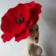 Flower Hat For Royal Ascot Party, Flower Headpieces For Royal Ascot Party, Red Hat With Handmade Flowers For Kentucky Derby, Red Structured Crown Costume Hat For Wedding, Red Structured Crown Headpiece For Wedding, Handmade Flowers Costume Hat For Party, Floral Headpiece For Kentucky Derby Party, Red Structured Crown Hat For Weddings, Red Handmade Flowers Fascinator For Wedding