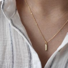 This gold-filled 'Mom' necklace is the perfect minimalist piece for those who appreciate a subtle yet meaningful touch to their jewelry. The tiny pendant, engraved with the word 'Mom,' is beautifully understated--ideal for layering or wearing alone for a delicate statement. The engraving is dainty, making it almost like a hidden message, only noticeable when you're up close. The necklace's shiny finish adds just the right amount of sparkle, without being overpowering. Perfect for new moms, seaso Minimalist Necklace Gold, Tiny Pendant, Hidden Message, Necklace Layering, Necklace Minimalist, Mom Necklace, Sweet Gifts, Layering Necklace, Minimalist Necklace