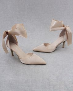 "An all-time classic and simplicity of satin pointy toe heels with satin ribbon ankle tie. Simple yet elegant are great combination and will definitely be a favorite. DETAILS: HEELS: 3 inches COLORS AVAILABLE: Black, Burgundy, Champagne, Dusty Pink, Light Blue, Ivory, and White UPPER: Synthetic upper and lining MATERIALS: Mandmade outsole ORIGIN: Imported STYLE NAME: BELL Not sure of which size to purchase? Shoes measurements are as follow: (Please note measurements taken the length of inside of Fall Wedding Shoes, Black Evening Shoes, Champagne Shoes, Pageant Shoes, Bridesmaids Shoes, Evening Heels, Holiday Shoes, Pointy Toe Heels, Pointy Toe Flats