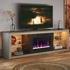 a living room with a television and fire place