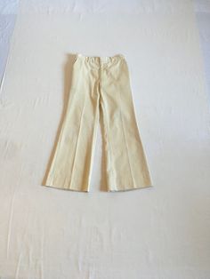 "vintage 1970s pants cotton/polyester blend w/rayon trim lining zip fly w/Talon claps top 2 front pockets, 1 back welt pocket wide leg bell hem crotch gusett good vintage condition, light wear-w/stains-see photos measures, lying flat, waist-15 1/2\" rise-11 1/4\" hip-19\" inseam-31\" hem-12\" outseam-42\"" 70s Inspired Cotton Pants For Fall, Vintage Flare Cotton Pants, Fitted Beige Cotton Wide Leg Pants, Vintage Wide Leg Yellow Pants, 70s Inspired Wide Leg Cotton Pants, 70s Inspired Cotton Wide Leg Pants, 1970s Style Wide Leg Cotton Bottoms, Vintage Stretch Cotton Bottoms, 1970s Style Wide Leg Cotton Pants