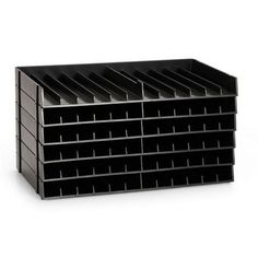 a stack of black plastic bins on a white background