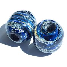 We are in process of updating our beads to a new look. Introducing new colors and more size options as well. Please feel free to reach out to us with any questions you may have This unique bead is created by mixing the ashes with molten borosilicate glass to form this swirling beauty of a glass Remembrance bead that you can wear close to your heart. Each bead is specially hand crafted for you, making it a very unique and truly one-of-a-kind memorial cremation jewelry necklace. Increase your savi Gift Recycled Glass Beads, Gift Recycled Glass Round Beads, Spiritual Recycled Glass Beads For Gifts, Recycled Glass Jewelry With Spacer Beads As Gift, Recycled Glass Spacer Beads Jewelry As Gift, Spiritual Glass Spacer Beads, Recycled Glass Round Beads Jewelry For Gifts, Recycled Glass Round Beads Jewelry Gift, Glass Beads Gift