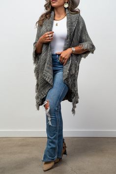 Conquer the unknown with our Adaline Knit Collared Cardigan/ Ruana. This luxurious, fashionable staple will keep you warm and stylish with its knit design and trendy fringe detail. Add a touch of boldness to your wardrobe and embrace the risk-taker within you! Casual Knit Sweater With Tassels, Trendy Fringe, Collared Cardigan, Risk Taker, Flannel Jacket, Collar Cardigan, Dec 12, Romper With Skirt, Anaheim