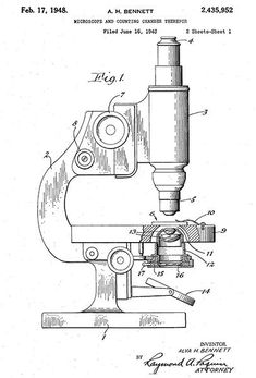 an old microscope is shown in black and white, with the word's name underneath it