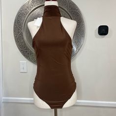 Wayf Brown Turtle Neck Sleeveless Body Suit- Size M Length: 30” Underarm To Underarm: 15” Materials: 96% Polyester, 4% Spandex Turtle Neck Sleeveless, Body Suit, Turtle Neck, Womens Tops, Spandex, Customer Support, Full Service, Women Shopping, Color