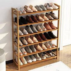 there are many pairs of shoes on the shelf