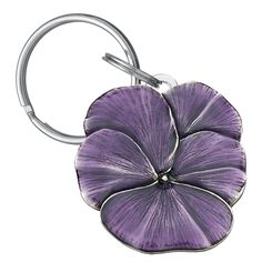 a purple flower shaped keychain on a white background with clipping to the side