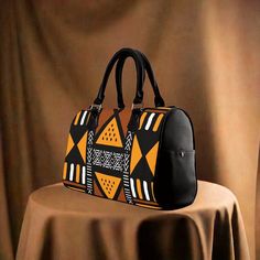 African Handbag with Ethnic Mud Cloth Pattern - Cultural & Stylish Traditional Handheld Shoulder Bag For Travel, Traditional Brown Bags For Daily Use, Traditional Brown Handheld Shoulder Bag, Traditional Rectangular Weekender Bag For Travel, Traditional Brown Satchel Bag, Traditional Black Travel Bag, Traditional Top Handle Travel Bag, Traditional Top Handle Satchel For Daily Use, Traditional Rectangular Satchel For Travel