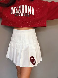 OU Sooners White Pleated Tailgate Skirt *Made with comfortable fabric and shorts underneath *Sizing measurements included in pictures *Sizing up 1-2 sizes is recommended Cheerleading Skirt With Built-in Shorts, Cotton Mini Tennis Skirt With Built-in Shorts, Cotton Tennis Skirt With Built-in Shorts, Cotton Skirt With Built-in Shorts, Short Cotton Pleated Skirt, Cheerleading Mini Skirt For Summer, White Cotton Cheerleading Bottoms, White Cotton Bottoms For Cheerleading, Mini Skirt Bottoms With Built-in Shorts For Cheerleading