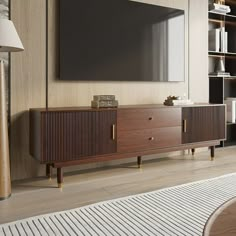 a living room with a large flat screen tv mounted on the wall and wooden furniture