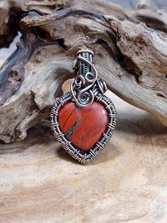 A double sided natural red jasper heart in a hand woven solid copper setting. Oxidized and polished for an antique finish. Matching chains and leather straps are available separately in my shop. Handmade Bronze Jewelry For Valentine's Day, Bohemian Heart-shaped Copper Jewelry, Bohemian Brown Heart-shaped Jewelry, Copper Heart Pendant For Jewelry Making, Handmade Copper Heart Pendant Jewelry, Handmade Red Copper Necklace, Bronze-colored Copper Heart-shaped Jewelry, Red Copper Pendant Necklace, Handmade Copper Heart Necklaces