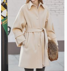 Product Description: handmade Cashmere coat high grade fabric,cashmere fabric.also could be custom made with any size and other colors,please feel free to contact with me if you want custom it. Material: cashmere 100% Size: S: Bust : 102 cm shoulder and Sleeve:70cm Length:105cm M: Bust : 106 cm shoulder and Sleeve:71cm Length:105cm L: Bust : 112cm shoulder and Sleeve:72cm Length:105cm XL: Bust : 116cm shoulder and Sleeve:73cm Length:105cm Shipping we ship worldwide the USPS takes about 15 days a Solid Wool Sweater Coat For Spring, Casual Wool Outerwear With Stand Collar, Spring Wool Sweater Coat, Spring Solid Wool Sweater Coat, Elegant Oversized Outerwear With Lapel Collar, Wool Outerwear With Stand Collar For Winter, Casual Winter Wool Coat With Stand Collar, Casual Wool Coat With Stand Collar For Winter, Winter Long Sleeve Single Breasted Pea Coat