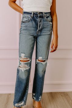 - Build your casual look around these stylish jeans! - Unlined denim material with subtle fading and distressed detail - A high waistline with belt loops and hidden button fly closure - A functional five pocket cut - A relaxed silhouette that ends in relaxed distressed hemlines Distressed Mom Jeans, Concert Fashion, Stylish Jeans, Essential Dress, Teacher Style, Denim Material, Curve Dresses, Denim Shop, Winter Dresses