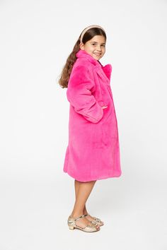 Fall nights can get a little chilly, so make sure to grab a fluffy coat to keep your mini me warm! She features three big button closure up the the front, two side pockets, and soft warm material! Throw her over any outfit to add a little warmth! Grab the Mommy & Me matching style: Zoey Hot Pink Winter Fur Coat With Plush Lining, Long Sleeve Fur Coat With Plush Lining, Winter Fur Coat With Plush Lining And Long Sleeves, Cozy Long Coat With Faux Fur Lining, Cozy Fluffy Outerwear For Cold Weather, Cozy Long Sleeve Fur Coat With Pockets, Cozy Pink Outerwear With Pockets, Casual Long Sleeve Fur Coat With Button Closure, Cozy Fluffy Long Sleeve Outerwear