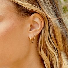 An instant classic - small 14k gold hoop earrings made for everyday stacking. Wear solo or mix & match with your favorite earring or diamond studs. Make it a single Product Details 14k solid gold 15 mm profile diameter and 1.2 mm wide Hinge closure | Classic 15 Mm Hoops Earring in 14K, Women's by Gorjana Everyday Stackable Earrings, Classic Stackable Huggie Earrings, Elegant Stackable Everyday Earrings, Elegant Stackable Huggie Earrings, Elegant Small Hoop Stackable Earrings, Stackable 14k Gold Earrings, Elegant Stackable Small Hoop Earrings, Classic Small Hoop Stackable Earrings, Elegant Sterling Silver Stackable Hoop Earrings