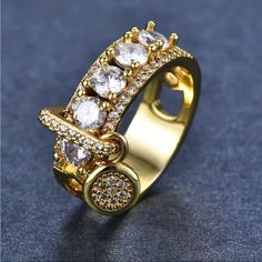 a gold ring with diamonds on it