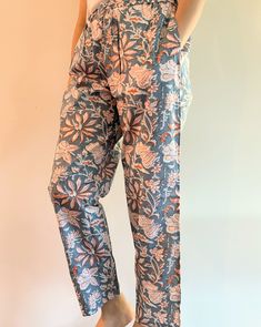 100% organic cotton pajamas in an elegant print that seamlessly marries the calming neutrality of grey with the vibrant warmth of orange blossoms. Adjustable waistband with drawstring for customizable fit. Practical pockets to keep your essentials close at hand like your phone or tv remote. No shrinkage, non-stretch. FREE  SAME DAY shipping. Ships from a small business in North Carolina, USA 🇺🇸  Perfect for those who value comfort and sustainability in their sleepwear. Ultimate comfort and bre Cotton Wide Leg Sleepwear For Relaxation, Wide Leg Cotton Sleepwear For Relaxation, Cotton Floral Print Sleepwear With Long Pants, Cotton Floral Print Sleepwear, Summer Loungewear Sleepwear Straight Pants, Summer Sleepwear Straight Pants For Loungewear, Wide Leg Cotton Sleepwear, Relaxed Fit Pants With Elastic Waistband For Bedtime, Cotton Bottoms For Home Use In Summer