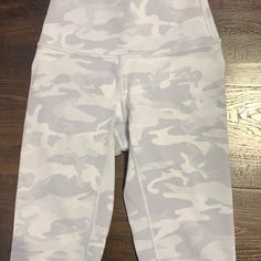 Lululemon Wunder Under High Rise Biker Shorts 8” Never Worn, Brand New Beautiful Condition. I Accidentally Bought Two Pairs So I Am Selling One. They Are Size 2, But They Do Run A Little Small If You Have Bigger Thighs. I Am Open To Offers :) These Are White And Grey/Silver Camo! Very Cute. Comment Any Questions Or Concerns I Will Answer When Possible!! White Yoga Activewear With Built-in Shorts, White Compression Biker Shorts With Built-in Shorts, White Athletic Shorts With Built-in Shorts For Light Exercise, White Activewear With Built-in Shorts, White Moisture-wicking Mid-thigh Bottoms, White Athleisure Activewear With Built-in Shorts, White Athleisure Shorts For Light Exercise, White Activewear With Built-in Shorts For Yoga, White Athleisure Athletic Shorts, Mid-thigh Length