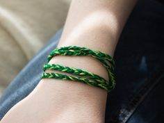 Get ready for summer with this green ombre bracelet! This hand-braided bracelet is made in four shades of green. The soft, high-quality cotton used is lightweight and colorfast so you can wear it non-stop, even to the shower or pool, and it's a perfect choice for people with metal allergies.  Our braided wraps are completely adjustable - you receive one long strand, and you can knot anywhere, so you can wear it tight, loose, or as a bracelet, anklet, or even choker! This bracelet is offered in m Macrame Wristband, Cottagecore Bracelet, Green Friendship Bracelet, Orange Macrame, Ombre Bracelet, Handmade Friendship Bracelets, Bracelet Summer, Bracelet Minimalist, Beach Bracelets