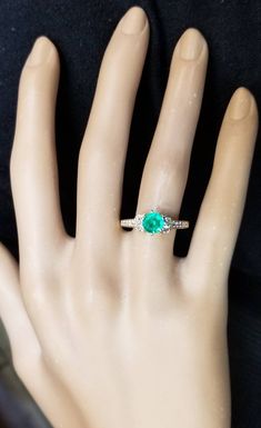 Gorgeous 18k Yellow gold ring natural green Emerald, Center round shape weight 0.92ct. size 5.9m very nice rich medium green color nice luster lively,brilliant stone and clean. side diamonds total weight 0.50ct. SI1-G ring size 7.5 Resizable Retail value $6,500 net . Appraisal available Green Moissanite Diamond Ring With Vvs Clarity, Emerald Cut Green Diamond Ring With Prong Setting, Fine Jewelry Green Diamond Promise Ring, Green Diamond Ring With Prong Setting, Green Diamond Ring With Vvs Clarity For May Birthstone, Green Diamond Promise Ring, Green Emerald Cut Moissanite Rings, Green Diamond Ring Fine Jewelry, Green Diamond Ring, Emerald Cut With Brilliant Cut