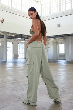 These sleek and stylish Loose Mid-Low Waist Trousers are the perfect option fpr this summer when you want to choose comfort and style. The soft feel make these luxurious to the touch and the perfect pant to dress up or down. Pair these with your favorite platforms and a tank top for the perfect date night look or throw them on with a shirt for a night in. Adjustable Drawstring at Waist--- Adjustable drawstring waist on both sides with toggles, distinct and active, allow for full range of motion, flattering with a sleek silhouette. Cute, chic, and unique. Relaxed Fit--- Straight leg with relaxed fit, mid-low waist design with loose and causal style, offer both style and comfort. Meanwhile, functional four side pockets design is an additional point to this pants. Upgrade your wardrobe with t Pantalon Parachute, Local European, Summer Punk, Parachute Pant, Perfect Date Night, The Perfect Date, Baggy Sweatpants, Perfect Pant, Perfect Date