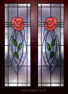 two stained glass doors with roses on them