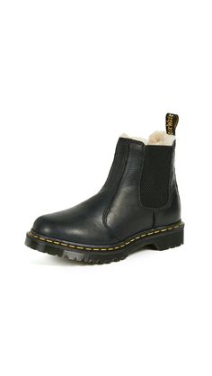 PRICES MAY VARY. Constructed for comfort on the iconic Dr. Martens air-cushioned sole This boot is Goodyear-welted, meaning the upper and sole are sewn together in our heat-sealed z-welt stitch. Good abrasion and slip resistance Lined with warm faux fur Retains essential Doc DNA, like yellow stitching, grooved sides, and heel loop Wipe away dirt with damp cloth Dr Martens Leonore, Chunky Chelsea Boots, How To Wear Ankle Boots, Doc Martens Outfit, Botas Chelsea, Fur Lined Boots, Womens Ankle Boots, Chelsea Boot, Doc Martens