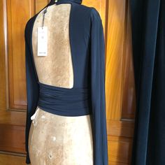 Size 10 Shown On Mannequin 34 28 35 Size 8. Elegant Total Backless With Tie Around Wrap Tie. Long Fitted Sleeves And Slight Turtleneck. Backless Turtleneck, Black Party Tops, Neon Crop Top, Black Lace Crop Top, Club L London, Nike Neon, Grey Crop Top, Rib Knit Top, Puff Sleeve Crop Top