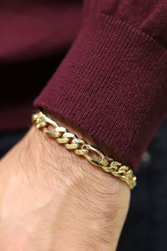 Classy and elegant Figaro bracelet. Made from pure 14k Yellow Gold and meant to be worn every day.----------About This Bracelet----------◆ Available in sizes 7.25 in and 8.25 in◆ Crafted in 14K Yellow gold, stamped "14k" for authenticity◆ Professionally Hand made, high polish finish◆ Great as a gift for him/her◆ Same day shipping (except weekends) and Comes in an elegant gift box!~~~~~~~~~Sizes & Weight~~~~~~~~~~~~Length 7.25 in = 12.42 GramsWidth 9mmLength 8.25 in = 14.18 GramsWidth 9mm-------- Gold Figaro Chain Link Bracelets, Gold Link Bracelets With Figaro Chain, Elegant Gold Charm Bracelet With Figaro Chain, Classic Hypoallergenic Gold Bracelet For Formal Occasions, Gold Bracelet With Figaro Chain, Formal Gold Plated Figaro Chain Bracelets, Hypoallergenic Gold Bracelet For Formal Occasions, Formal Hypoallergenic Gold Bracelet, Elegant Formal Bracelet With Figaro Chain