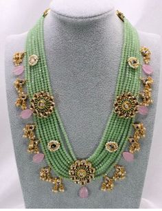 Beautifully handcrafted necklace in semiprecious colored beads, stones and kundan work on a gold base. Green Temple Necklace For Festivals And Reception, Gold Kundan Beaded Necklaces For Reception, Kundan Beaded Necklace For Receptions And Festivals, Green Chandbali Necklace With Zari Work, Gold Kundan Beaded Necklace For Reception, Green Kundan Necklace For Reception And Festivals, Green Kundan Necklace For Receptions And Festivals, Green Beaded Bridal Necklace In Temple Jewelry Style, Green Bollywood Beaded Necklaces For Festive Occasions