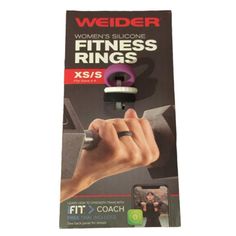 an advertisement for the weider women's silicone fitness rings, featuring a hand holding