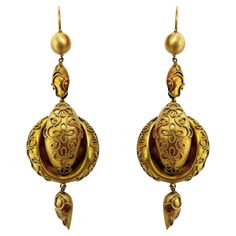 Elevate your look and embrace the elegance of the past with these 14k Victorian Drop Earrings. Made from 14k yellow gold, these earrings feature intricate details and a length of 2 inches for a refined touch. In good condition, they offer a timeless and lightweight option at 7.1 grams. 14k Victorian Drop Earrings Condition: In good condition with some minor surface wear consistent with age. Period: Victorian Length: 2 inches Metal: 14k Yellow Gold Weight: 7.1 grams Luxury Ceremonial Pierced Earrings, Victorian Engraved Earrings For Formal Occasions, Elegant Oval Earrings With Intricate Design, Formal Engraved Drop Earrings, Antique Yellow Gold Drop Earrings, Victorian Yellow Gold Drop Earrings, Antique Yellow Gold Earrings For Formal Occasions, Antique Yellow Gold Earrings For Formal Events, Ornate Yellow Gold Oval Earrings