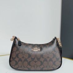 Find ideas๏ฟฝand inspiration for NWT COACH CA548 Women๏ฟฝs Teri Shoulder Bag In Signature Canvas Gold/Brown Black, bags Coach Teri Shoulder Bag, Luxury Bags Collection, Coach Shoulder Bag, Signature Canvas, Women's Bags, Brown Gold, Luxury Bags, Fashion Bags, Bags Handbags