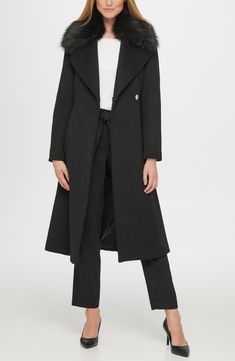 An inset bib panel with a stand collar brings runway-ready edginess to a belted coat woven from a luxurious wool blend. 46" length (size S) Drape collar with inset stand collar Long sleeves Asymmetric zip closure Front welt pockets Lined Shell: 60% wool, 40% polyester; Faux fur: 50% acrylic, 50% modacrylic   Dry clean Imported Model Stats: 5'10" height; 34" bust; 27" waist; 35" hips. Model is wearing size S. Fashion Basics, Belted Coat, Karl Lagerfeld Paris, Wool Blend Coat, Basic Style, A Stand, Fur Trim, Karl Lagerfeld, Welt Pockets