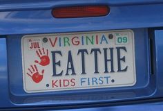 a license plate that says, virginia eat the kids first with red handprints on it