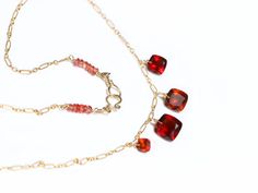 THE JEWELRY IS SHIPPED via DHL EXPRESS (2-5 days delivery door to door). THE DHL SHIPPING COST IS INCLUDED IN THE PRICE. The Lava Necklace - Hessonite Garnet Necklace, Red Orange Gemstone Necklace ► Measurements / Details: - Necklace Length: Made to order - Clasp: Secure Artisan Clasp (possible to change to a regular 9mm Lobster Clasp, just please leave a note during the checkout or write me) - Gold: High quality 14K Gold Filled ► Gemstones: The Necklace includes excellent AAA quality gemstones, Red Crystal Pendant Necklace With Natural Stones, Red Natural Stone Crystal Pendant Necklace, Elegant Red Necklace With Stones, Elegant Faceted Carnelian Necklace, Red Faceted Carnelian Jewelry, Red Pendant Crystal Necklaces With Gemstone, Red Gemstone Pendant Crystal Necklaces, Red Faceted Pendant Necklaces, Red Gemstone Pendant Crystal Necklace